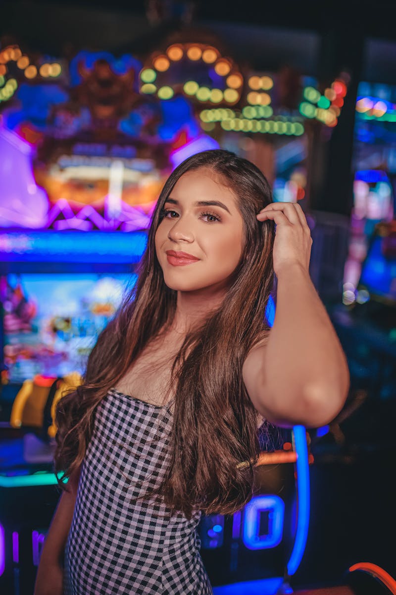 A well-lit subject in a casino environment with intentional directional light and colorful background bokeh